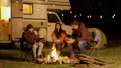 People sitting around a campfire